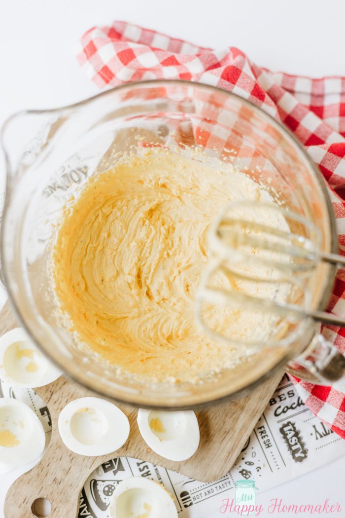 Hot Dog Deviled Eggs - filling in a bowl being made