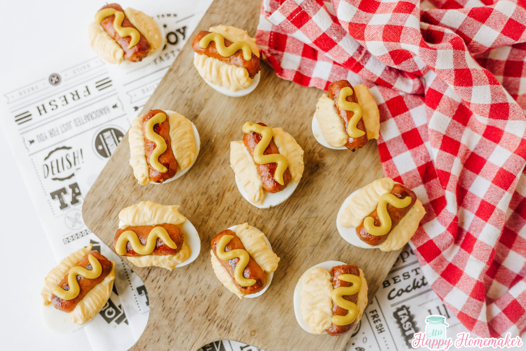 Hot Dog Deviled Eggs on a cutting board