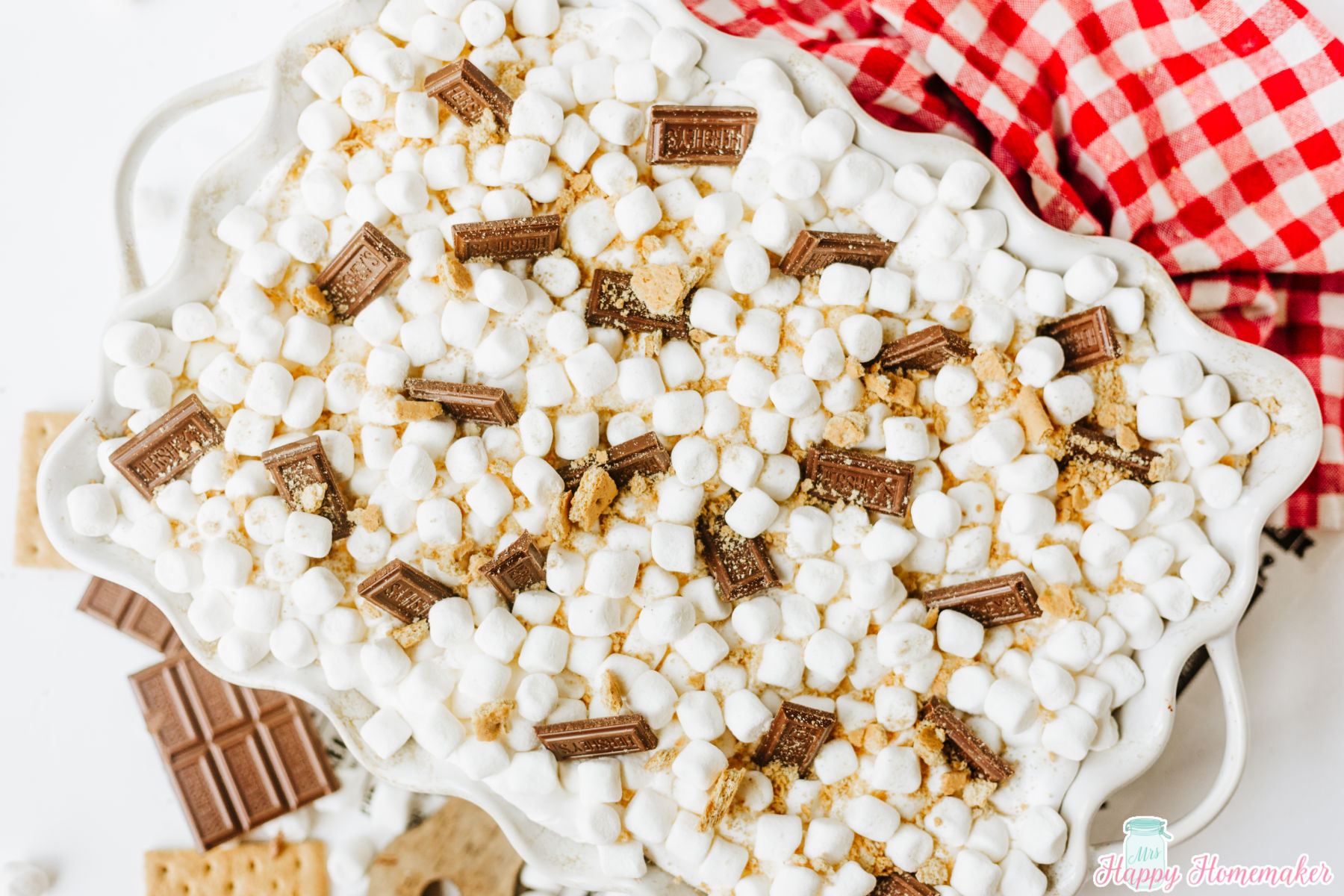 S'mores Lasagna in a white casserole dish