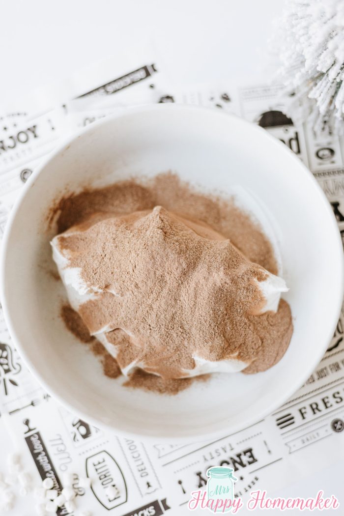 cool whip and hot cocoa mix in a bowl