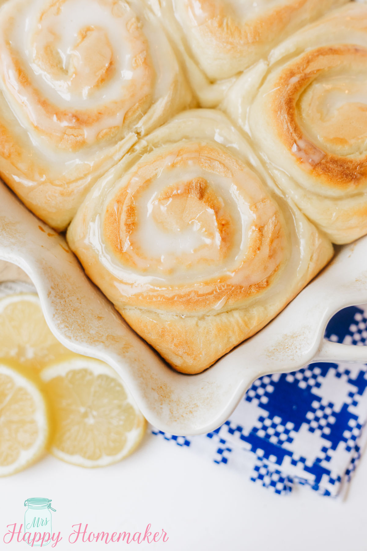 closeup picture of a frosted lemon roll