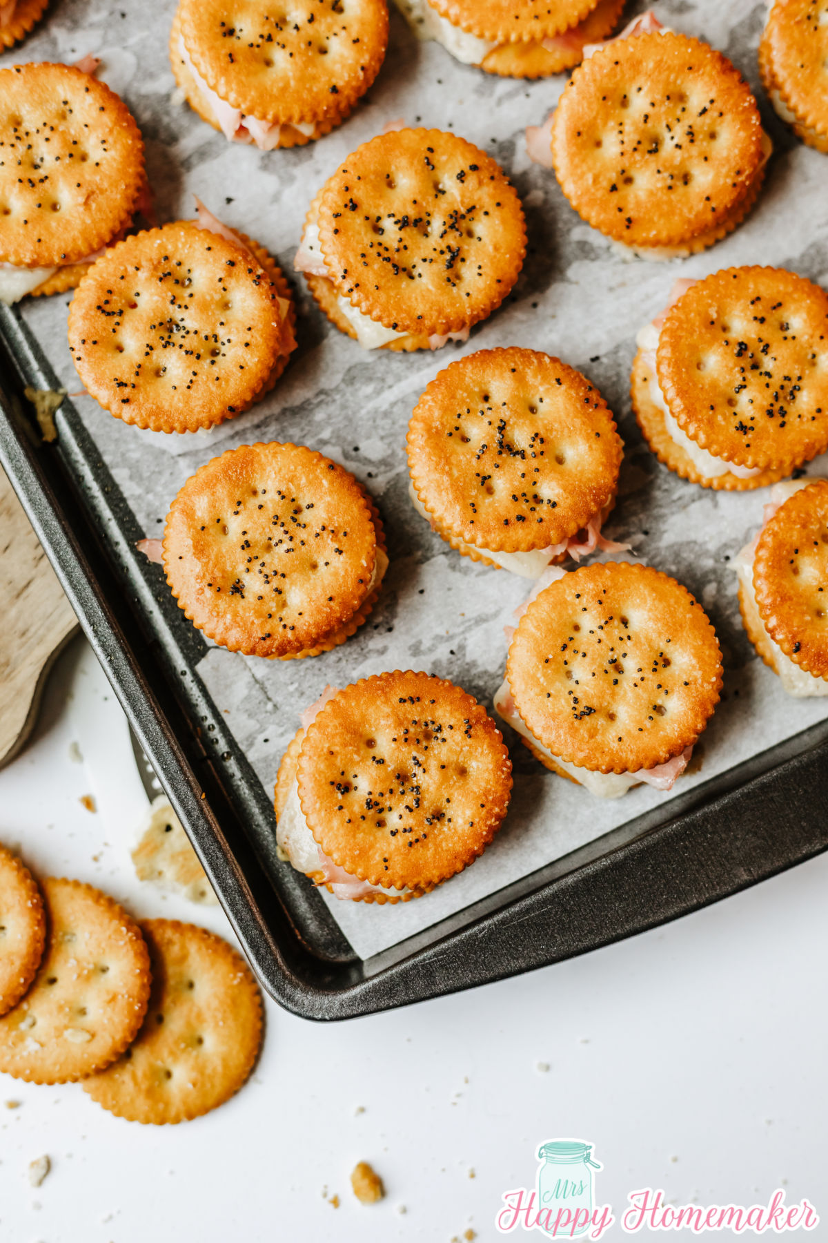 Ritz Cracker Party Sandwiches on a parchment paper lined baking sheet