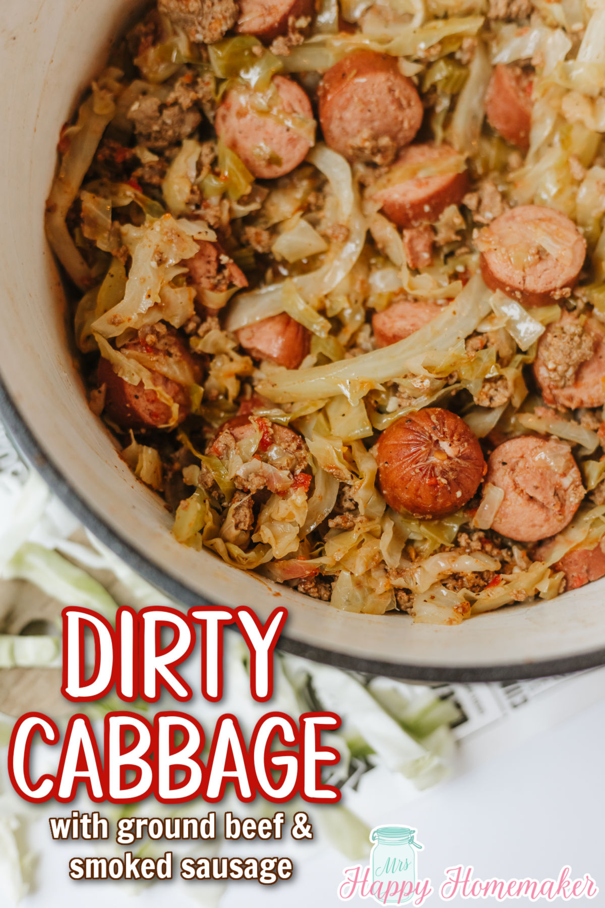 Southern Dirty Cabbage with ground beef & smoked sausage in a round dutch oven