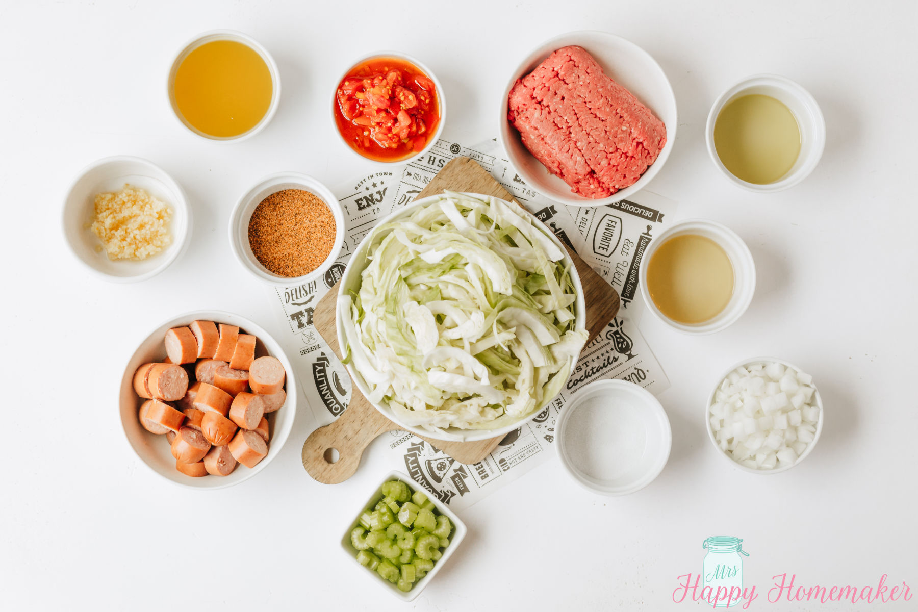 ingredients to make dirty cabbage on a white countertop placed in individual ramekins