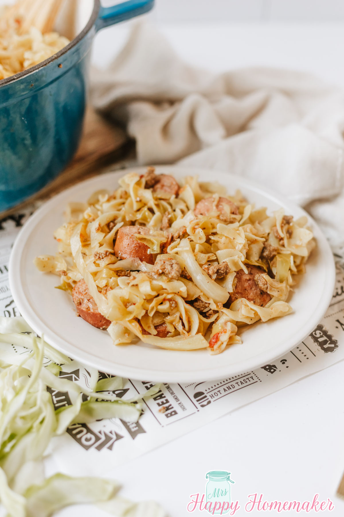 Viral Style Dirty Cabbage and Noodles served up on a white plate