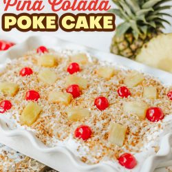 Simple & Easy Pina Colada Poke Cake in a white rectangle cake dish