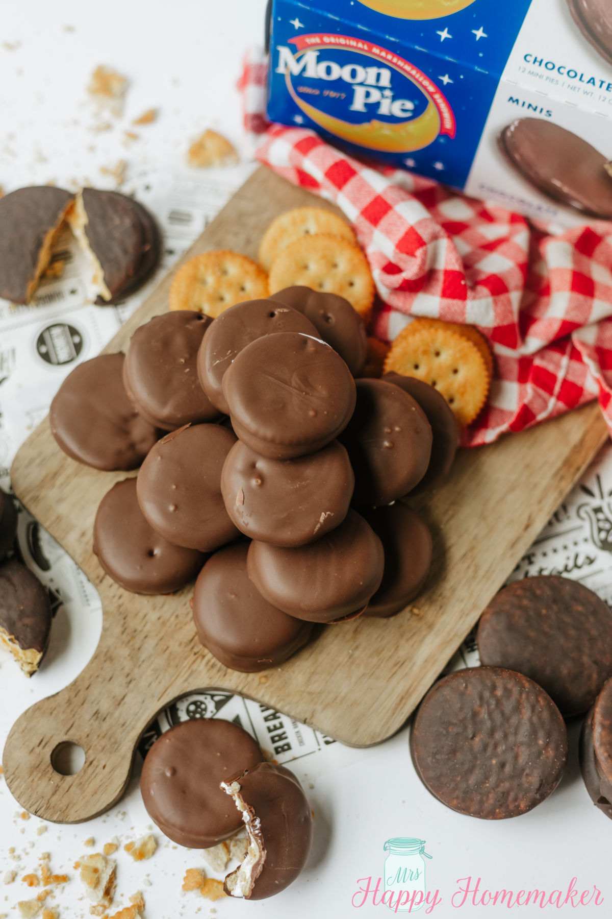 homemade 3 ingredient Moon Pies displayed on a wooden cutting board