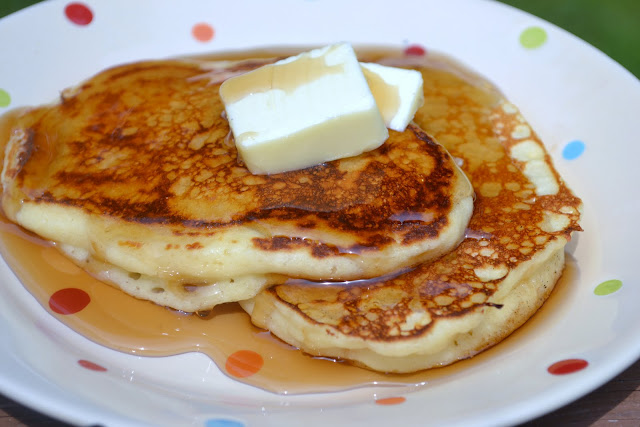 Buttermilk pancakes with butter and syrup 