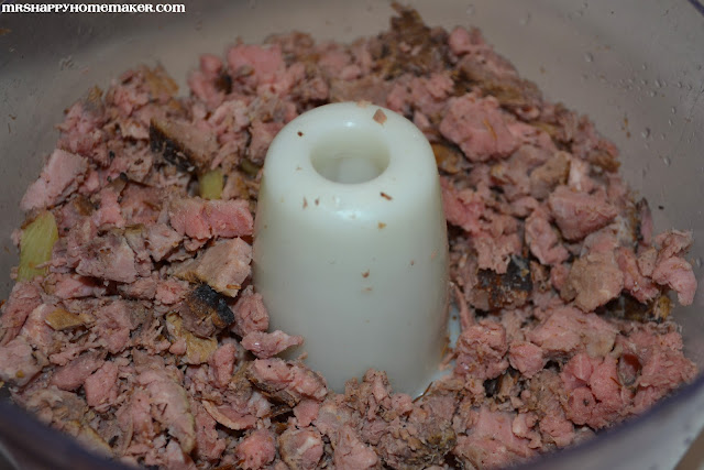leftover steak being ground up in a food processor 