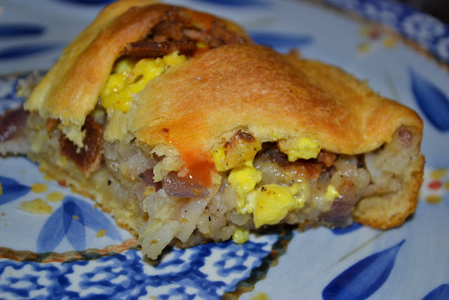 Breakfast Crescent Ring with bacon, egg, cheese, and hash browns with a crescent roll crust. 