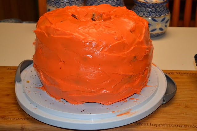 pumpkin carrot cake, shaped and frosted like a pumpkin